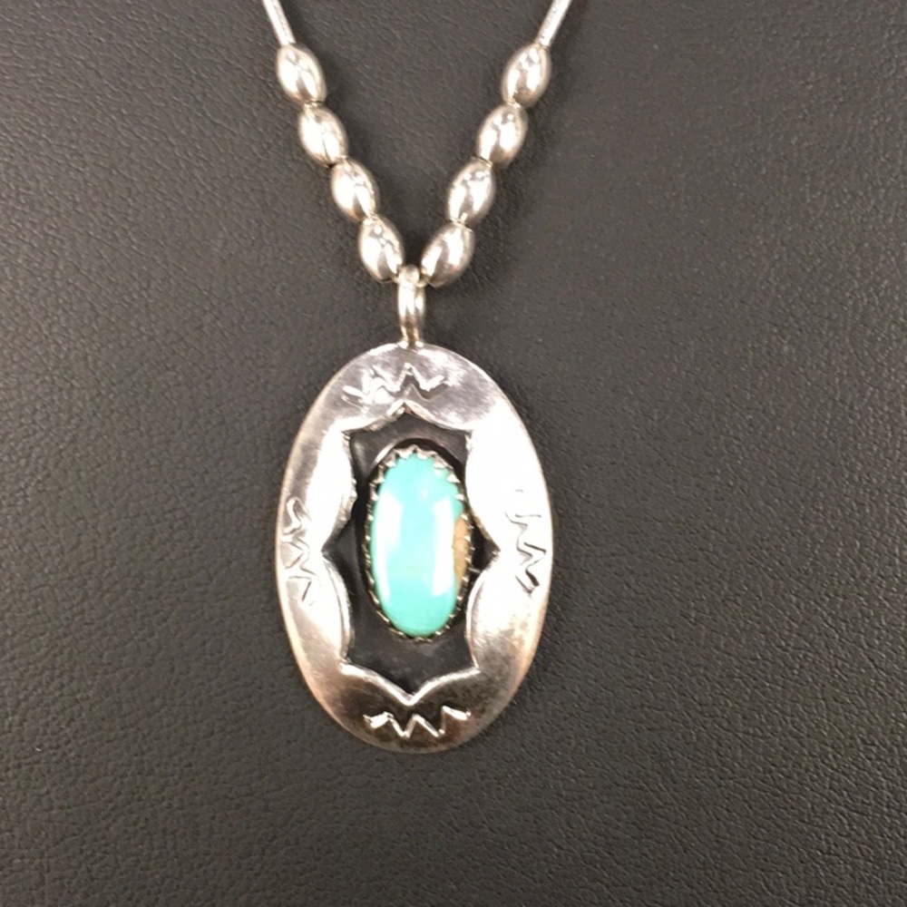 Silver necklace pendant w/ turquoise stone